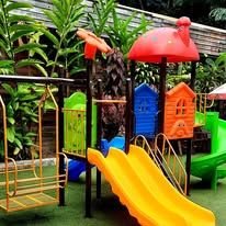 Children's playground with colorful slides and swings