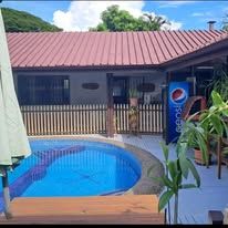 Exterior view of the lodge rooms overlooking the outdoor pool.