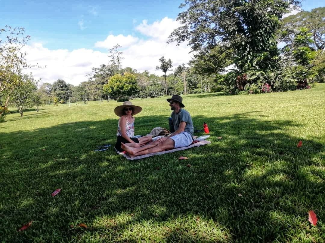 Guests enjoying a picnic on the expansive green lawns of the club.