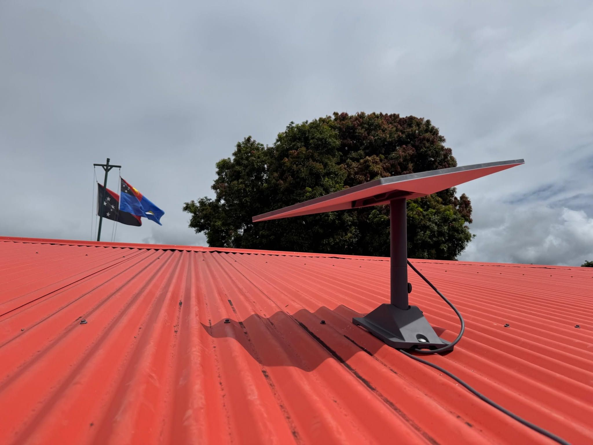 High-speed internet receiver mounted on the resort's red iron roof.