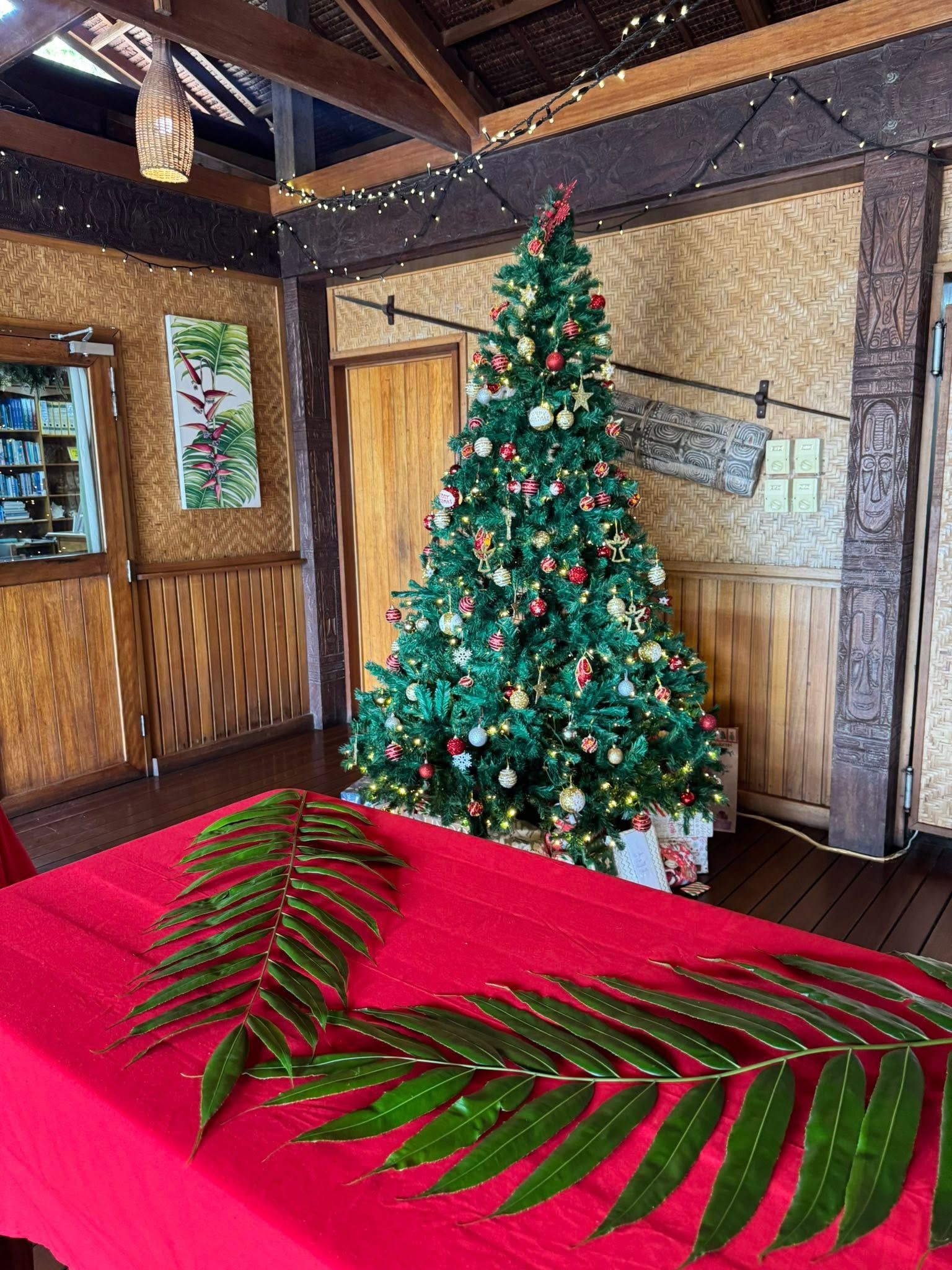 Christmas decorations and local palm leaves in the dining hall.