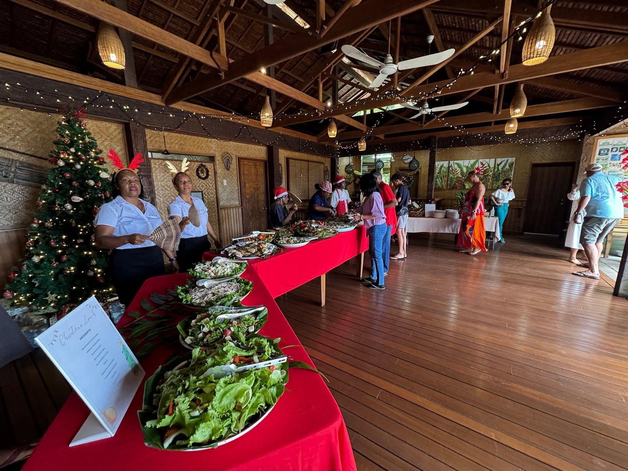 Buffet setup for a festive lunch in the resort's timber dining hall.