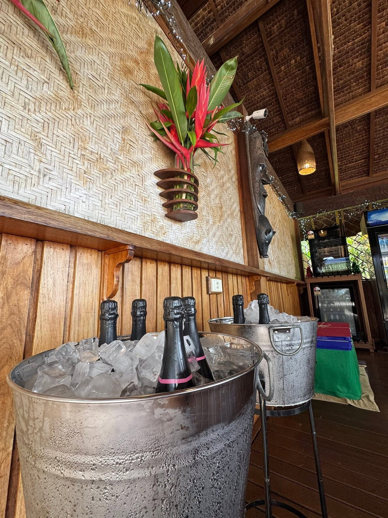 Chilled bottles in ice buckets ready for a resort celebration.