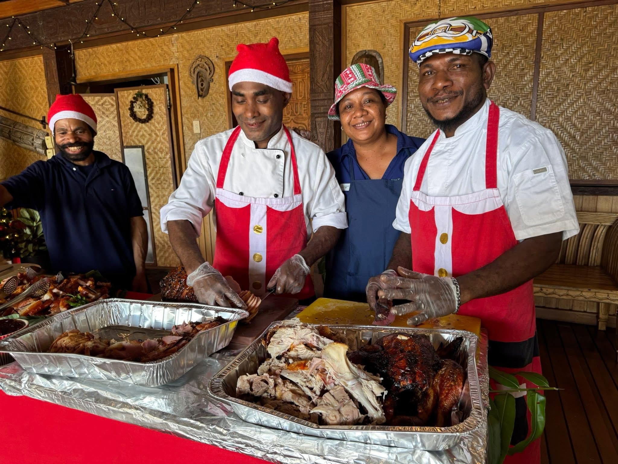 Resort chefs preparing the festive buffet for guests.