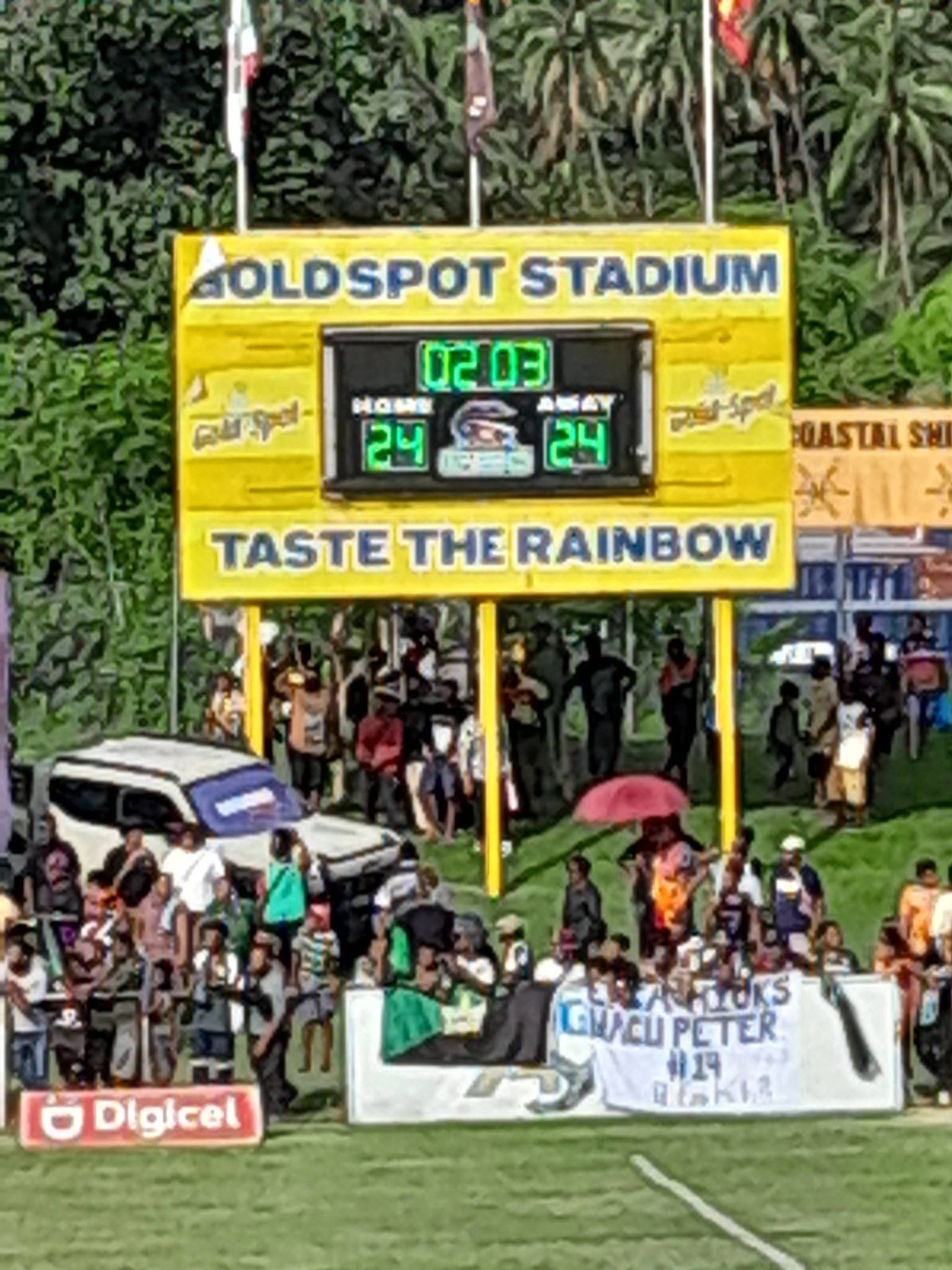 The stadium scoreboard displaying results during a local event.