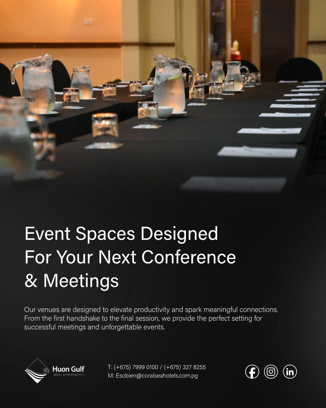 Conference table set with water pitchers and glasses